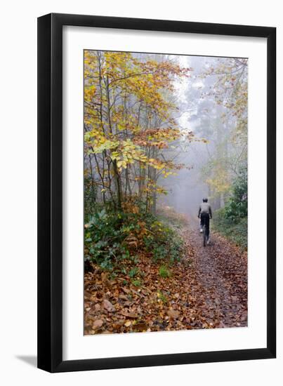 Forest cycling-Charles Bowman-Framed Premium Photographic Print