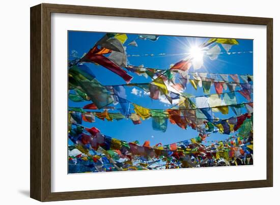 Forest' of Prayer Flags Backlit Against the Sun at the Top of Khardung La Pass (5,606M) North of…-null-Framed Photographic Print