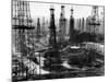 Forest of Wells, Rigs and Derricks Crowd the Signal Hill Oil Fields-Andreas Feininger-Mounted Photographic Print
