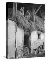 Former GI Ernest Kreiling Showing His Bride the Hayloft Where He Spent Thanksgiving 1944-null-Stretched Canvas