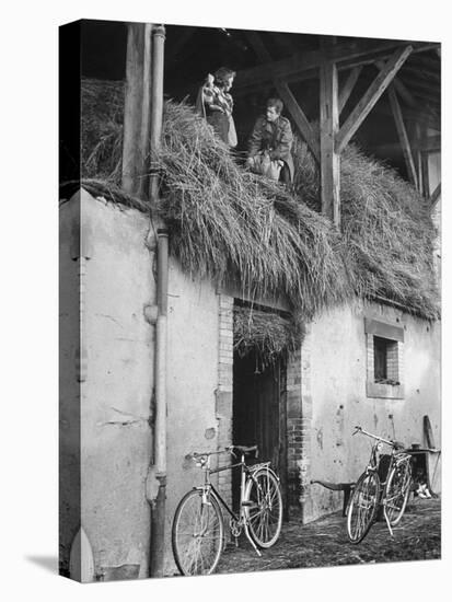 Former GI Ernest Kreiling Showing His Bride the Hayloft Where He Spent Thanksgiving 1944-null-Stretched Canvas