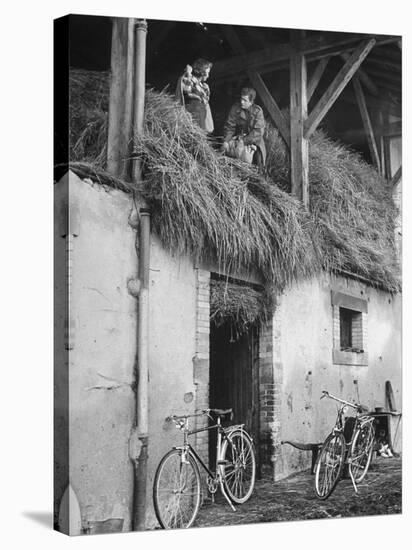 Former GI Ernest Kreiling Showing His Bride the Hayloft Where He Spent Thanksgiving 1944-null-Stretched Canvas