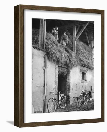 Former GI Ernest Kreiling Showing His Bride the Hayloft Where He Spent Thanksgiving 1944-null-Framed Photographic Print