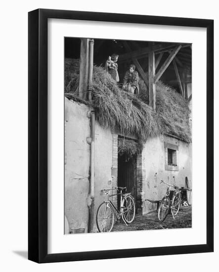 Former GI Ernest Kreiling Showing His Bride the Hayloft Where He Spent Thanksgiving 1944-null-Framed Photographic Print