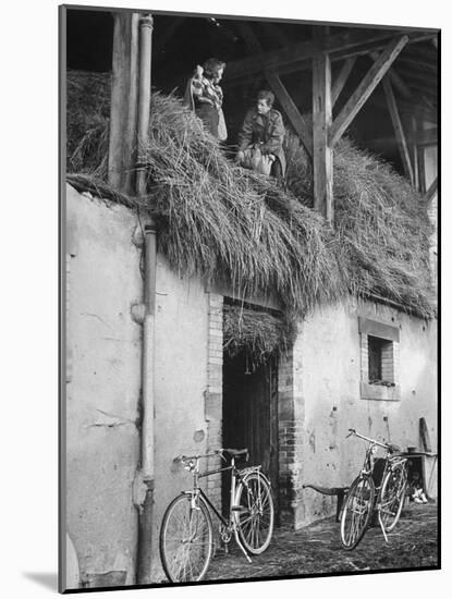 Former GI Ernest Kreiling Showing His Bride the Hayloft Where He Spent Thanksgiving 1944-null-Mounted Photographic Print