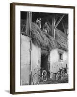 Former GI Ernest Kreiling Showing His Bride the Hayloft Where He Spent Thanksgiving 1944-null-Framed Photographic Print