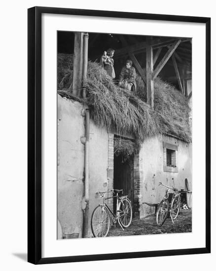 Former GI Ernest Kreiling Showing His Bride the Hayloft Where He Spent Thanksgiving 1944-null-Framed Photographic Print