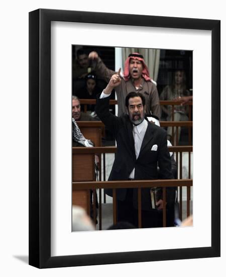 Former Iraqi President Saddam Hussein Berates the Court During their Trial in Baghdad-null-Framed Photographic Print