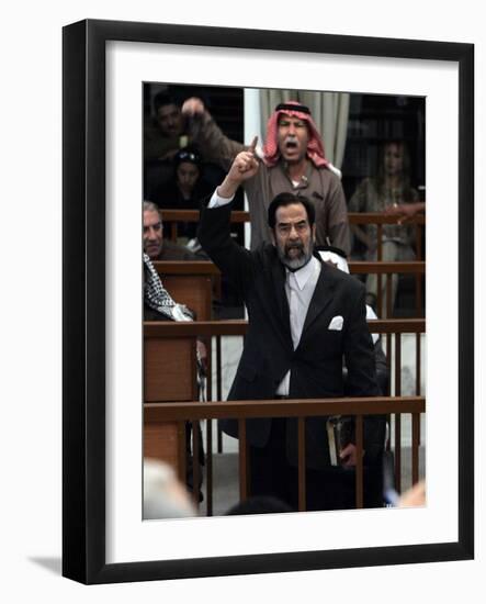 Former Iraqi President Saddam Hussein Berates the Court During their Trial in Baghdad-null-Framed Photographic Print