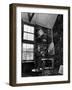 Former PM Winston Churchill Smoking a Cigar in His Studio Dressed in His Blue RAF Siren Jump Suit-Hans Wild-Framed Premium Photographic Print