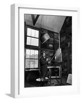 Former PM Winston Churchill Smoking a Cigar in His Studio Dressed in His Blue RAF Siren Jump Suit-Hans Wild-Framed Premium Photographic Print