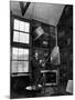 Former PM Winston Churchill Smoking a Cigar in His Studio Dressed in His Blue RAF Siren Jump Suit-Hans Wild-Mounted Premium Photographic Print