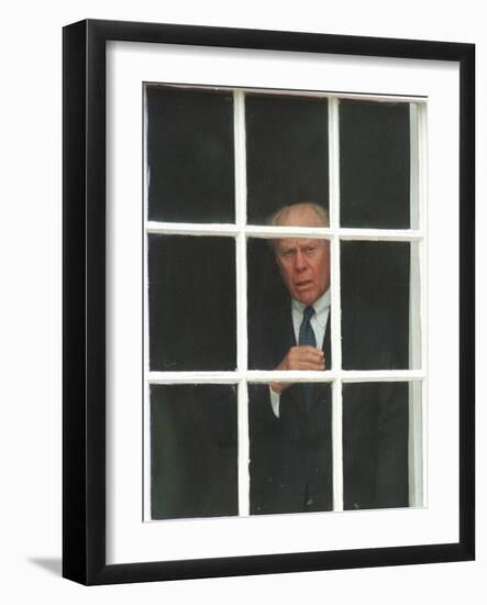 Former President Gerald Ford Peers out a Window-null-Framed Photographic Print