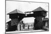 Fort Lewis, WA Main Gate with Soldier Photograph - Fort Lewis, WA-Lantern Press-Mounted Art Print