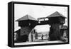 Fort Lewis, WA Main Gate with Soldier Photograph - Fort Lewis, WA-Lantern Press-Framed Stretched Canvas