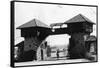 Fort Lewis, WA Main Gate with Soldier Photograph - Fort Lewis, WA-Lantern Press-Framed Stretched Canvas
