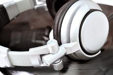 Dj Headphones Lying over Black Vinyl-fotosutra.com-Photographic Print