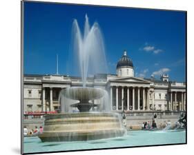 Fountain in front of the National Gallery on Trafalgar Square, London-null-Mounted Art Print