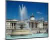 Fountain in front of the National Gallery on Trafalgar Square, London-null-Mounted Art Print