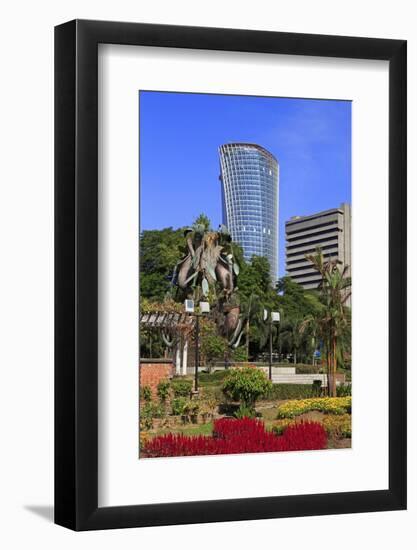 Fountain Sculpture and Jkr Tower, Kuala Lumpur, Malaysia, Southeast Asia, Asia-Richard Cummins-Framed Photographic Print