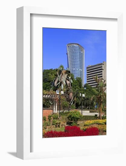 Fountain Sculpture and Jkr Tower, Kuala Lumpur, Malaysia, Southeast Asia, Asia-Richard Cummins-Framed Photographic Print