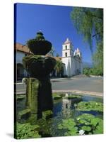 Fountain with Water Lilies, the Mission in the Background, Santa Barbara, California, USA-Tomlinson Ruth-Stretched Canvas