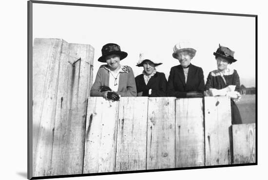 Four Adult Sisters Pose Along a Fence, Ca. 1910-null-Mounted Photographic Print