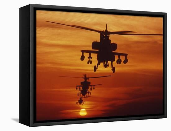 Four AH-64 Apache Anti-armor Helicopters Fly in Formation at Dusk-Stocktrek Images-Framed Stretched Canvas