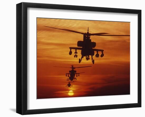 Four AH-64 Apache Anti-armor Helicopters Fly in Formation at Dusk-Stocktrek Images-Framed Photographic Print