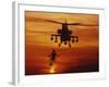 Four AH-64 Apache Anti-armor Helicopters Fly in Formation at Dusk-Stocktrek Images-Framed Photographic Print