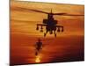 Four AH-64 Apache Anti-armor Helicopters Fly in Formation at Dusk-Stocktrek Images-Mounted Photographic Print