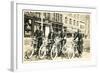 Four Bicyclists Downtown-null-Framed Art Print