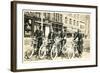 Four Bicyclists Downtown-null-Framed Art Print