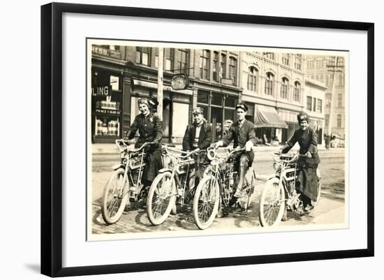 Four Bicyclists Downtown-null-Framed Art Print