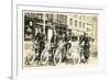 Four Bicyclists Downtown-null-Framed Art Print