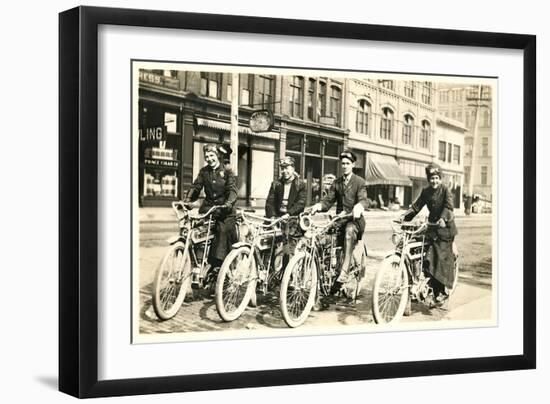 Four Bicyclists Downtown-null-Framed Art Print