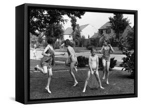 Four Children in Bathing Suits Playing with Water Sprinkler and Running Through Spray on Front Lawn-Alfred Eisenstaedt-Framed Stretched Canvas