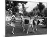 Four Children in Bathing Suits Playing with Water Sprinkler and Running Through Spray on Front Lawn-Alfred Eisenstaedt-Mounted Photographic Print