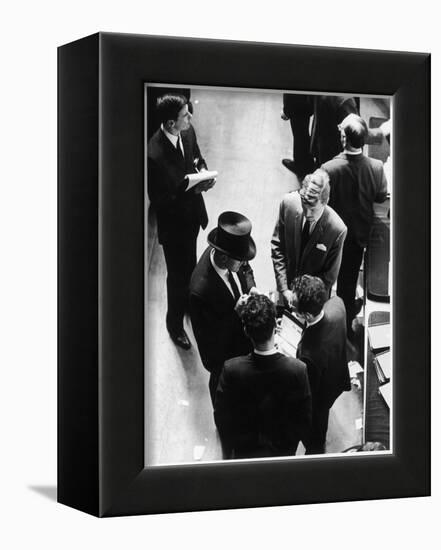 Four City Traders on the London Stock Exchange Compare Notes-null-Framed Art Print