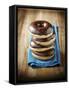 Four Doughnuts with Chocolate Glaze, Stacked-Michael Löffler-Framed Stretched Canvas