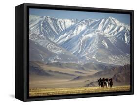 Four Eagle Hunters in Tolbo Sum, Golden Eagle Festival, Mongolia-Amos Nachoum-Framed Stretched Canvas