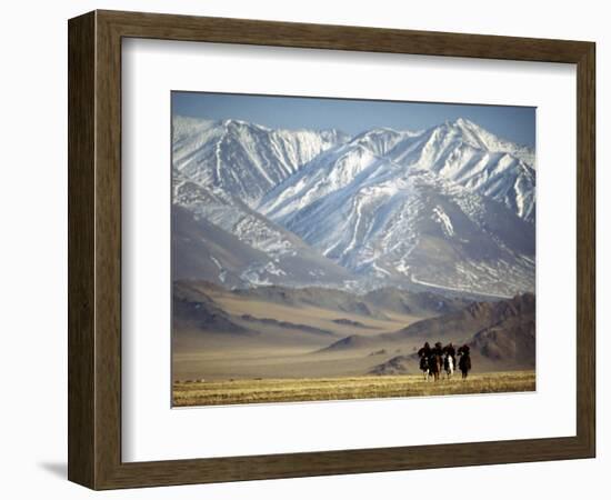 Four Eagle Hunters in Tolbo Sum, Golden Eagle Festival, Mongolia-Amos Nachoum-Framed Photographic Print