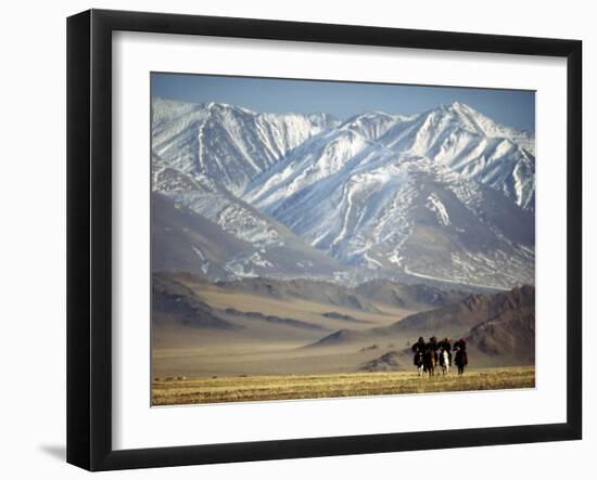 Four Eagle Hunters in Tolbo Sum, Golden Eagle Festival, Mongolia-Amos Nachoum-Framed Photographic Print