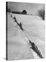 Four Ft. of Snow Almost Covering Up Snow Fence in Front of Barn on the Hill on Upstate Farm-Andreas Feininger-Stretched Canvas