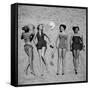 Four Models Showing Off the Latest Bathing Suit Fashions While Lying on a Sandy Florida Beach-Nina Leen-Framed Stretched Canvas