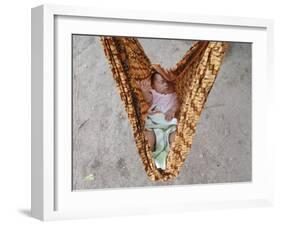 Four-Month-Old Rianto Sleeps in a Batik Cloth Swing, at a Refugee Camp in Lamreh, Indonesia-null-Framed Photographic Print