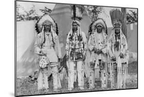 Four Native American Chiefs in Traditional Clothing and Feathered Bonnet-null-Mounted Art Print