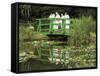 Four Nuns Standing on the Japanese Bridge in the Garden of the Impressionist Painter Claude Monet-David Hughes-Framed Stretched Canvas