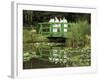 Four Nuns Standing on the Japanese Bridge in the Garden of the Impressionist Painter Claude Monet-David Hughes-Framed Photographic Print