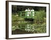 Four Nuns Standing on the Japanese Bridge in the Garden of the Impressionist Painter Claude Monet-David Hughes-Framed Photographic Print